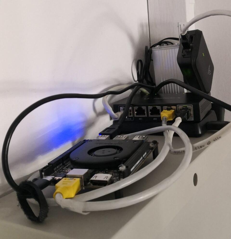 Lattepanda Alpha, external HDD and Edgerouter X sitting on top of a fuse box
